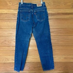 Y2K Levi's 550 medium wash Relaxed Fit Tapered Leg mom jeans